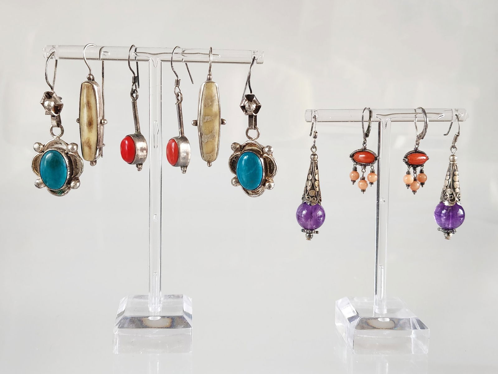Estate Vintage 5 Pairs of Sterling Silver & Gemstone Earrings: Estate Vintage 5 Pairs of Sterling/ Coin Silver & Gemstone Earrings. Including; with turquoise, coral, amethyst stones and bone. Marks: 900, Sajen/ 925, 925. Total weight: 40.5 grams. Provenance: Esta