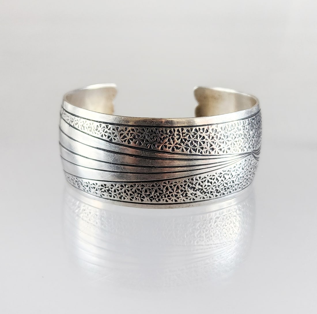 Estate Vintage Native American Navajo Sterling Silver Cuff Bracelet: Estate Vintage Native American Navajo Sterling Silver Cuff Bracelet. Marks:Sterling/ JS Total weight: 40 grams. Provenance: Estate of Victoria Salter (1944-2024) Victoria Salter was the daughter of Ha
