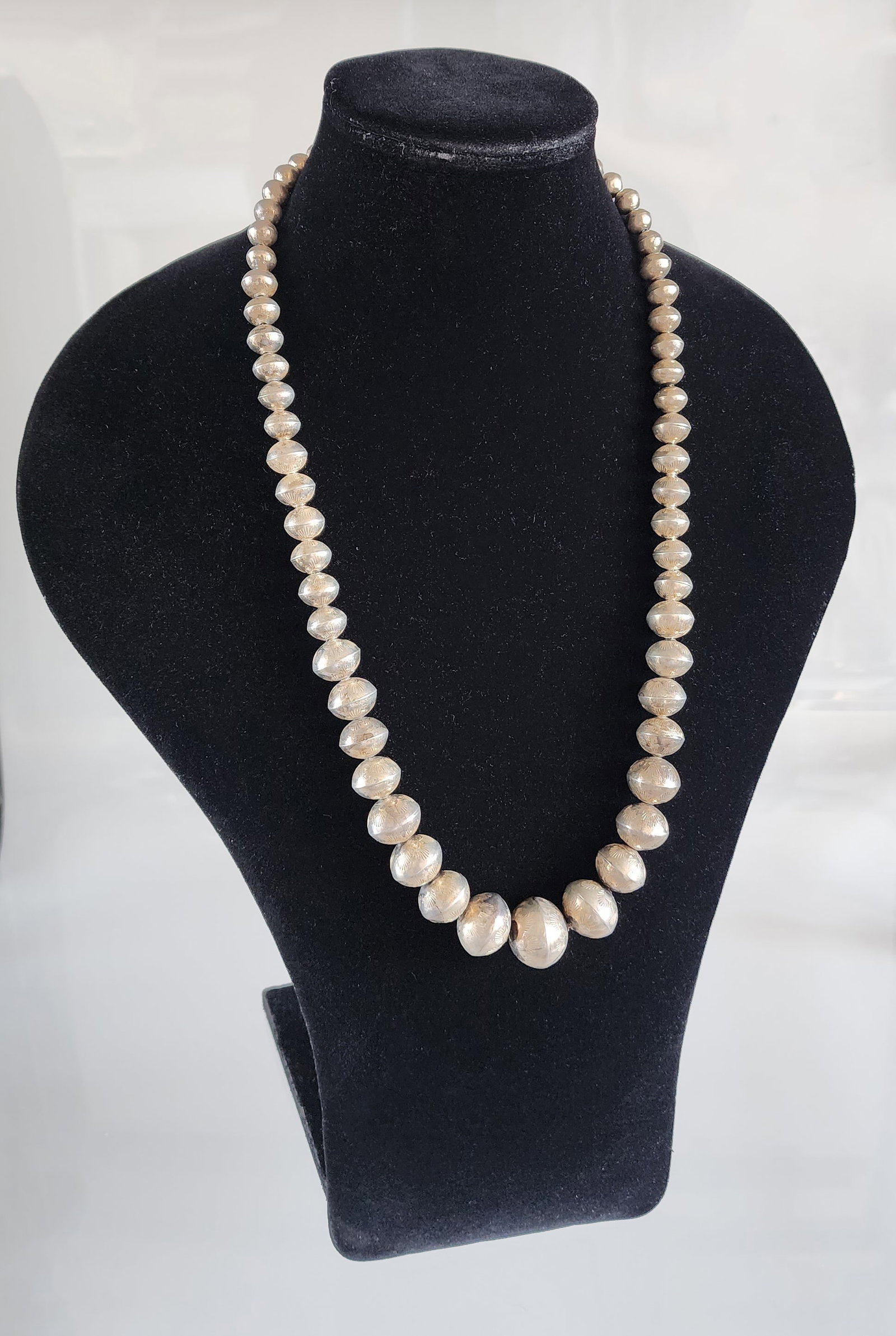 Estate Vintage Native American Sterling Navajo Pearl Necklace: Estate Vintage Native American Sterling Navajo Pearl Necklace with tooled beads. Length 29 inches. Marks: Sterling. Total weight: 92.6 grams. Provenance: Estate of Victoria Salter (1944-2024) Victoria