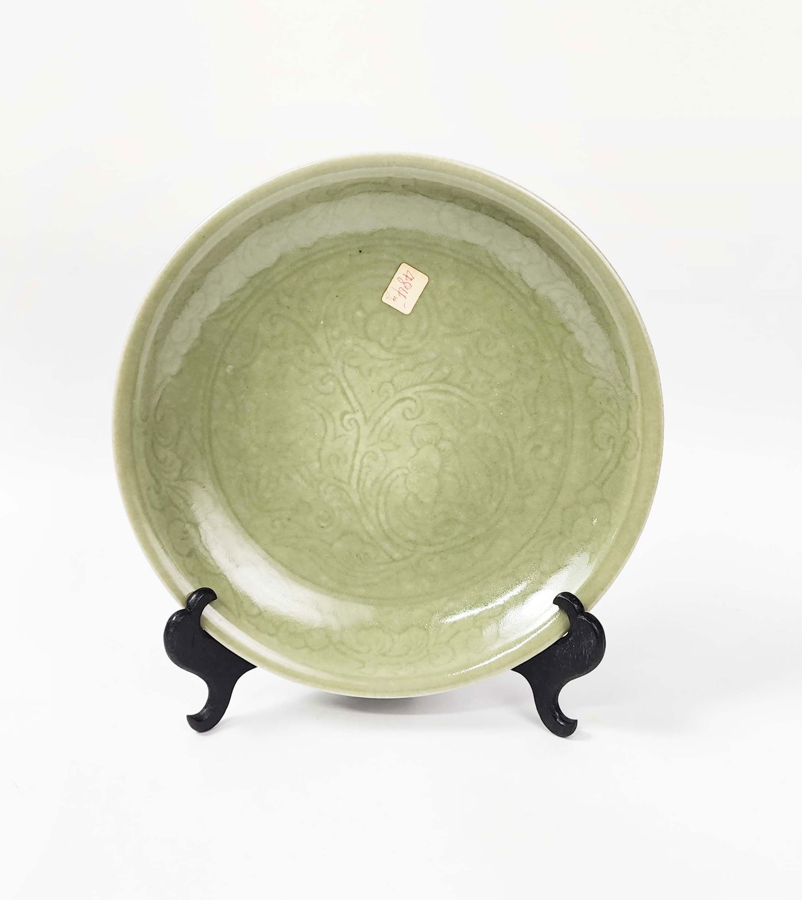 Chinese Longquan Celadon Glazed Porcelain Platter: Chinese Longquan Celadon Glazed Porcelain Platter, h. 10.5 inches, circa mid 20th century. Provenance: Estate of a New York collector/ dealer. The collection assembled between early 1950s to 1970s.