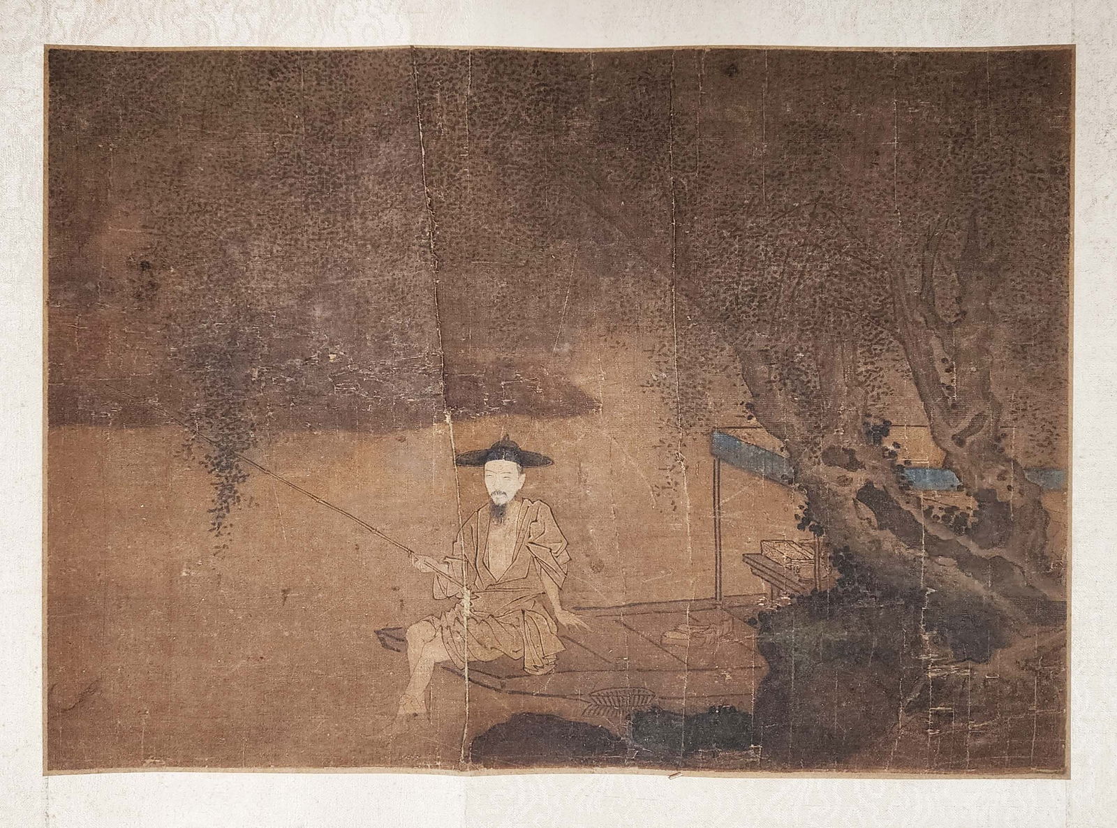 Antique Chinese Painting on Silk of a Fisherman: Antique Chinese Painting on Silk of a Fisherman,23.5 x 14.5 inches, (painting without the borders 15.5 x 11)circa 18th- 19th century. Likely mounted later. Provenance: Estate of a New York collector/