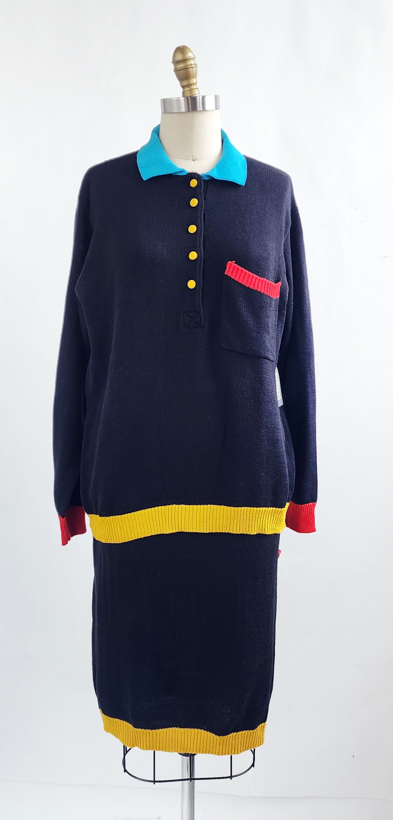 KooKai Black, Blue, Red, Yellow Wool Knit Sweater & Skirt Set, 1980s: KooKai Products Black, Blue, Red, Yellow Wool Blend Knit Sweater & Skirt Set, 1980s, ca. late 1980s -early 1990s. Sweater- one size, skirt size L. New old stock with tags.