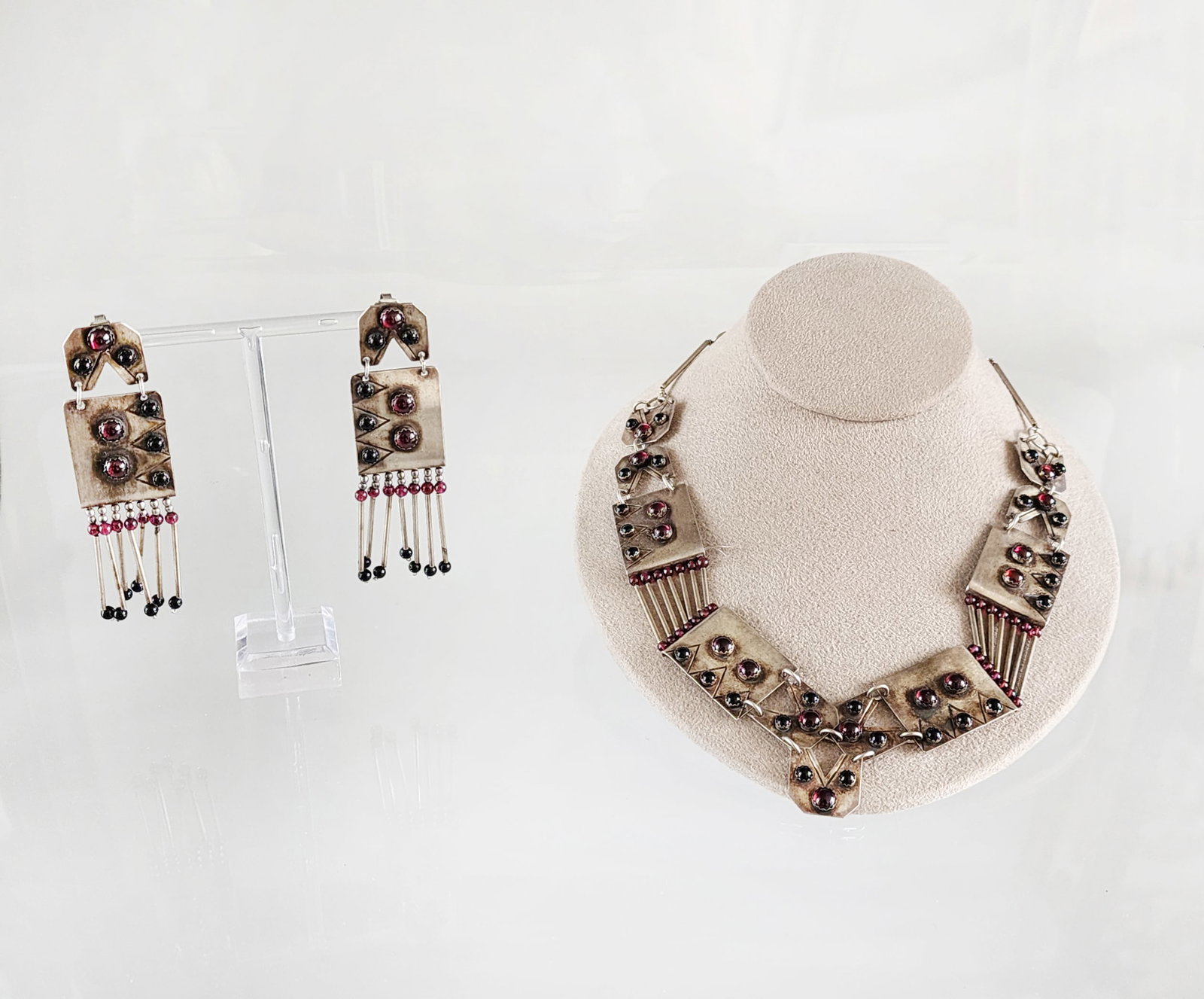 Estate Vintage Sterling Silver & Garnet Necklace and Earrings: Estate Vintage Sterling Silver & Garnet Artisan Made Necklace and Earrings. Marks: unmarked Total weight: 73 grams. Provenance: Estate of Victoria Salter (1944-2024) Victoria Salter was the daughter o
