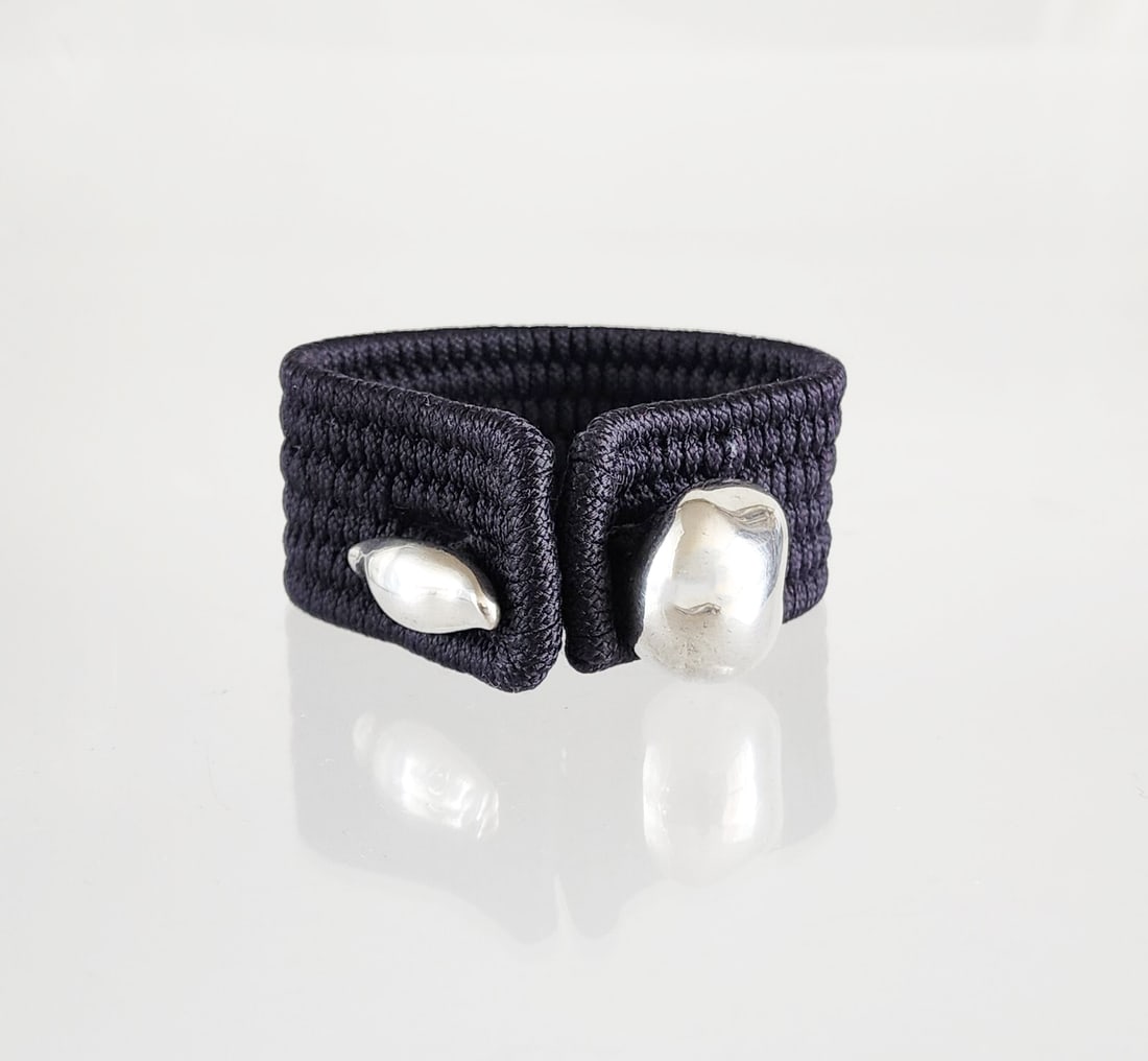 Estate Vintage Elsa Peretti Sterling Silver and Woven Cuff Bracelet: Estate Vintage Elsa Peretti for Tiffany &Co Sterling Silver and Woven Cuff Bracelet with Bag Marks: Total weight: 32 grams. Provenance: Estate of Victoria Salter (1944-2024) Victoria Salter was the da