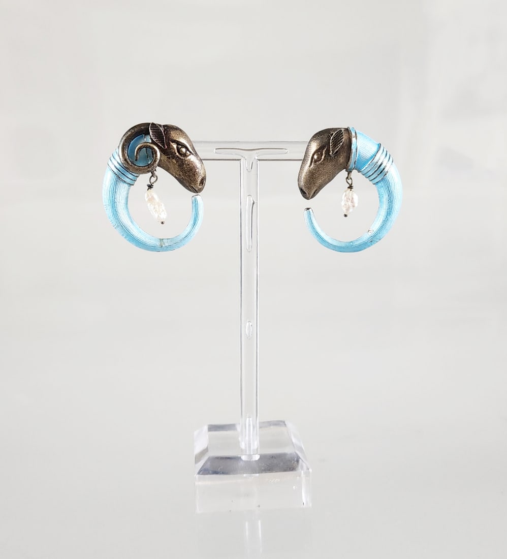 Estate Vintage Sterling Silver & Gold Vermeil Assyrian Ram Earrings: Estate Vintage Sterling Silver & Gold Vermeil Assyrian Ram Earrings Marks: 925/SI Total weight: 9.7 grams. Provenance: Estate of Victoria Salter (1944-2024) Victoria Salter was the daughter of Harry S