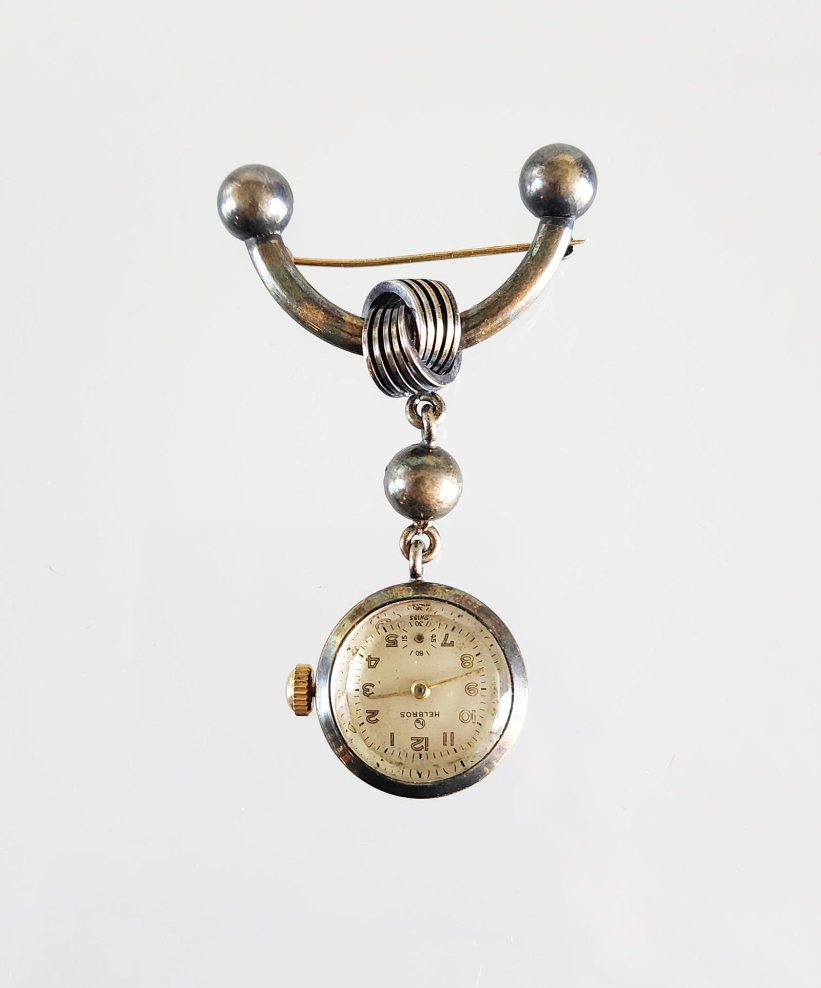 Estate Vintage Sterling Silver Helbros Swiss Nurses Watch Brooch: Estate Vintage Sterling Silver Helbros Swiss Nurses Watch Brooch Marks: Helbros/SWISS Total weight: 18.5 grams. Provenance: Estate of Victoria Salter (1944-2024) Victoria Salter was the daughter of Ha