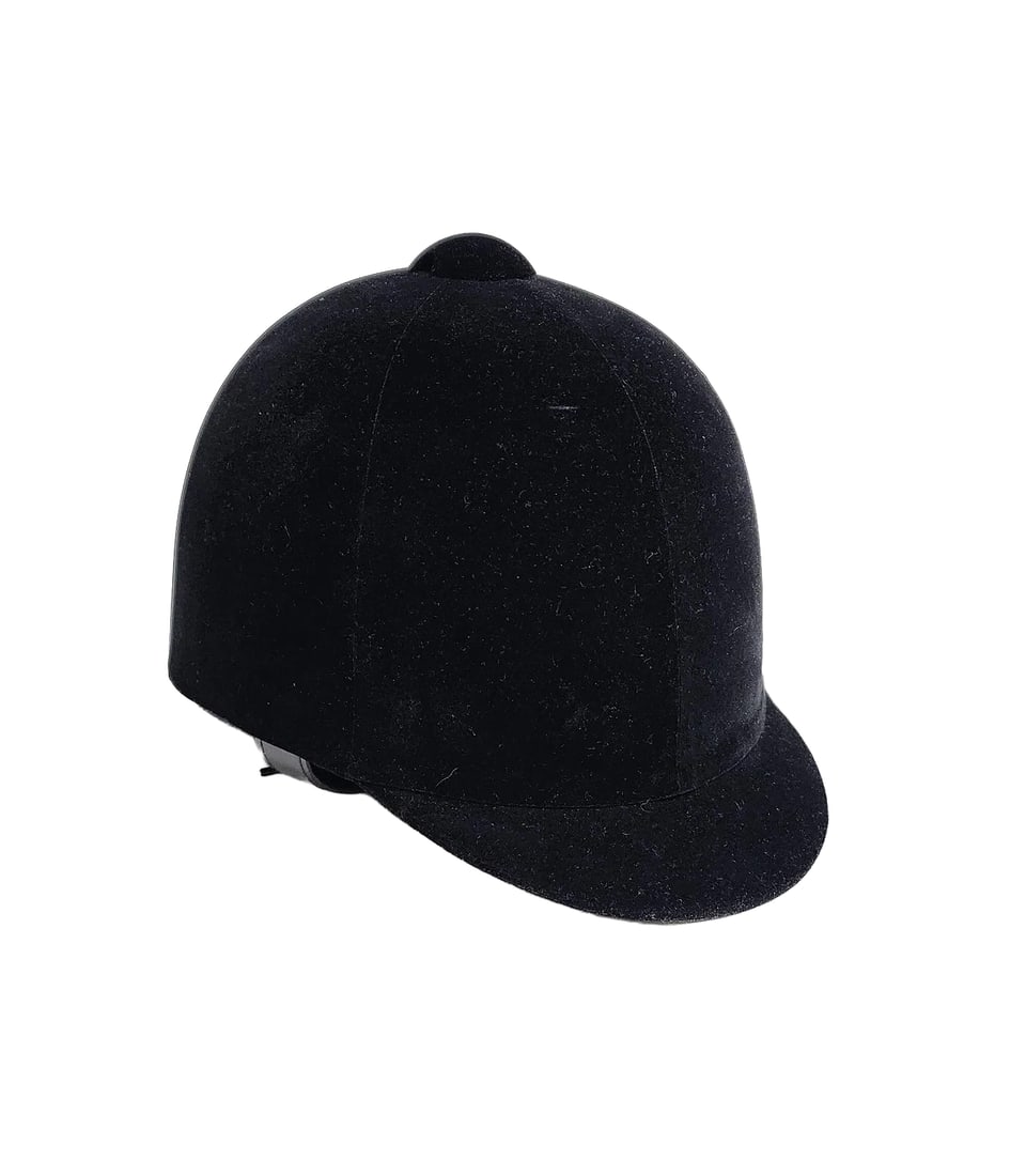 IRH Medalist Traditional Hunt Cap Style Black Velvet Riding Helmet, Sz 7 1/4: IRH International Riding Helmets Medalist Traditional Hunt Cap Style Black Velvet Riding Helmet, circa 2000. Size 7 1/4. Provenance: Estate of Mary Stone Phipps (1936-2022) (Mrs. Howard Phipps Jr.), E