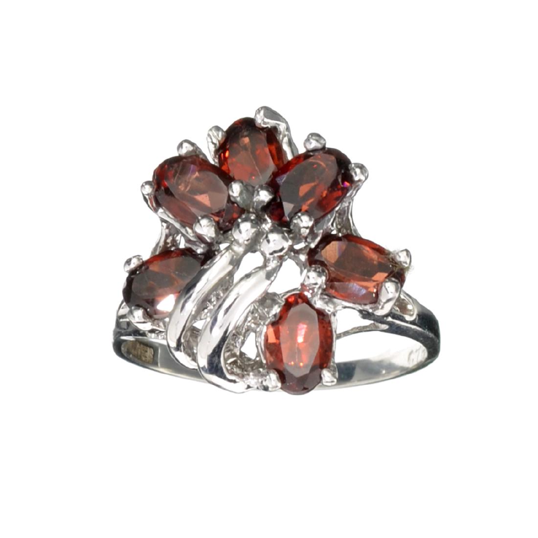 APP: 0.5k Fine Jewelry Designer Sebastian, 3.25CT Oval: Gov. File: H-29658 Fine Jewelry Designer Sebastian, 3.25CT Oval Cut Almandite Garnet And Sterling Silver Cluster Ring Retail Replacement Value: $0.5K Asset Type: Ring Shipping: $19.95
