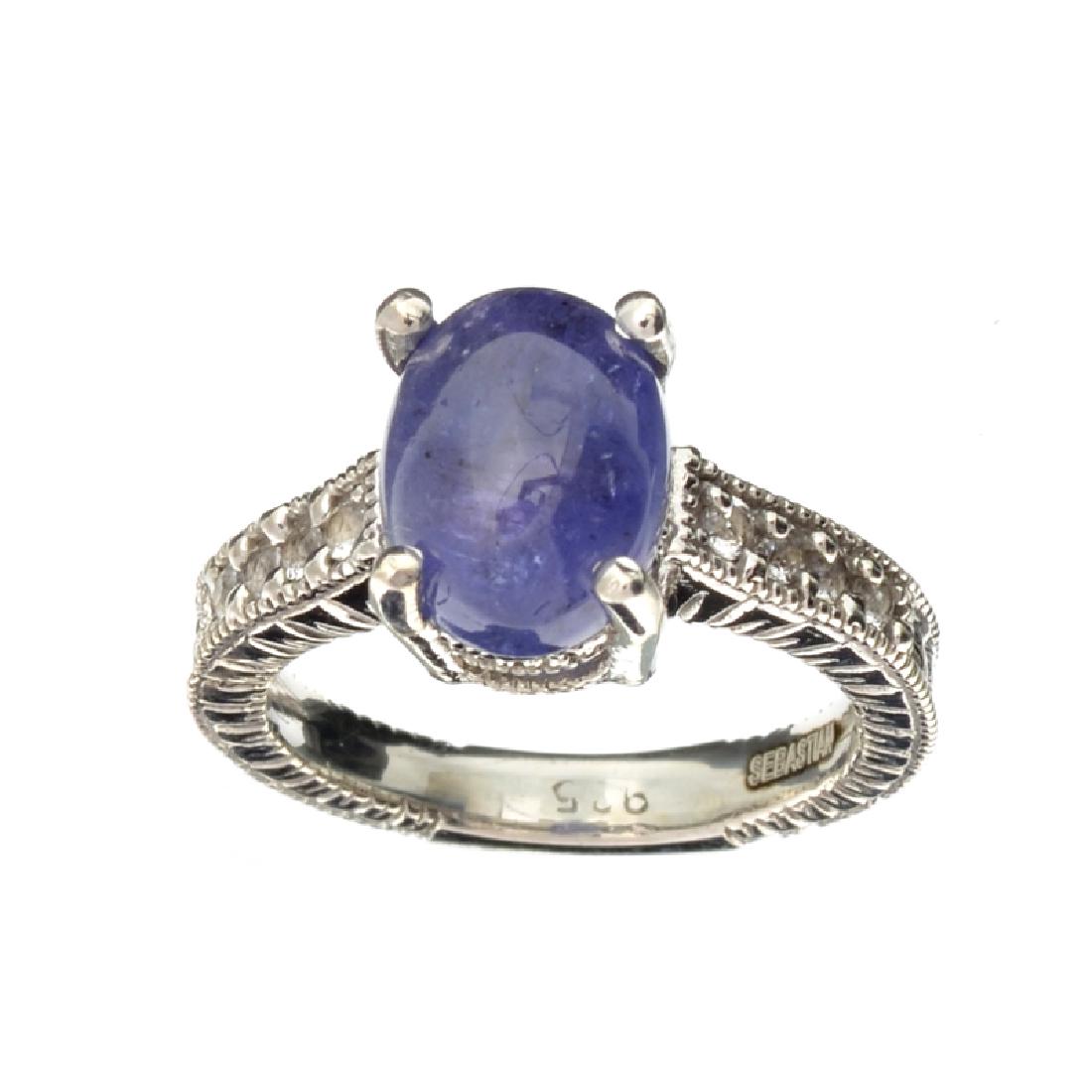 APP: 3.4k Fine Jewelry Designer Sebastian 4.27CT: Gov. File: K-07399 Fine Jewelry Designer Sebastian 4.27CT Tanzanite And Topaz Platinum Over Sterling Silver Ring Retail Replacement Value:$3.4KRing Shipping: $19.95