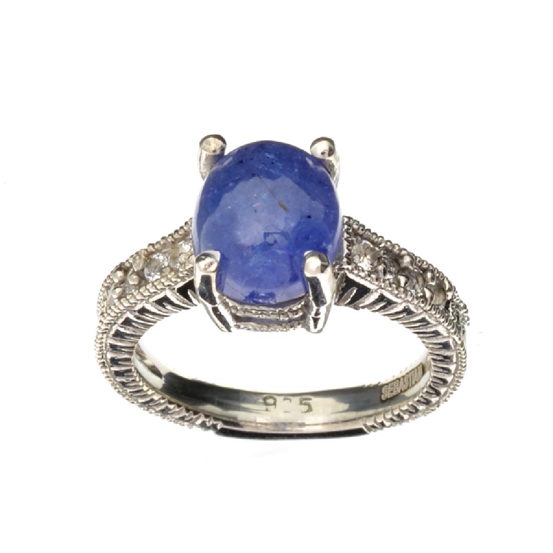 APP: 3.4k Fine Jewelry Designer Sebastian 4.27CT: Gov. File: K-07393 Fine Jewelry Designer Sebastian 4.27CT Tanzanite And Topaz Platinum Over Sterling Silver Ring Retail Replacement Value:$3.3KRing Shipping: $19.95