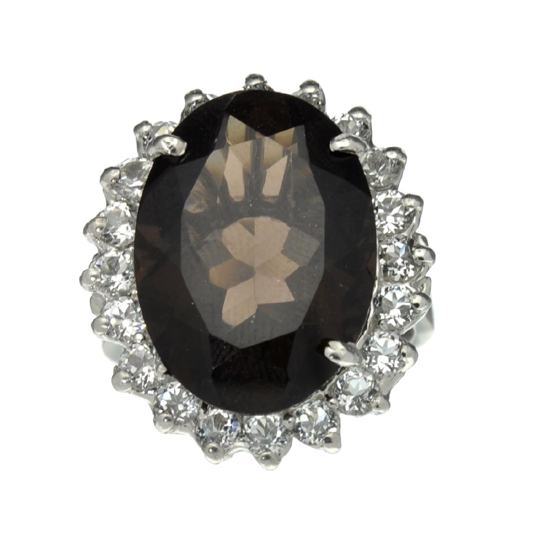 APP: 1k Fine Jewelry Designer Sebastian, 12.51CT Smoky: Gov. File: H-31663 Fine Jewelry Designer Sebastian, 12.51CT Smoky Quartz And White Topaz Sterling Silver Ring Retail Replacement Value: $1.0K Asset Type: Ring Shipping: $19.95
