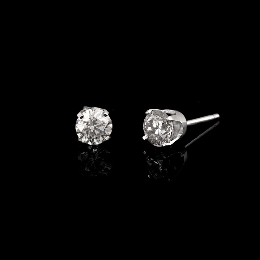 APP: 4.6k *Fine Jewelry 14 kt. White Gold, Custom Made: Gov. File: H-18492 *Fine Jewelry 14 kt. White Gold, Custom Made 1.00CT Round Brilliant Cut Diamond Earrings (VGN A-13) Retail Replacement Value: $4.6K Asset Type: Earrings Shipping: $19.95