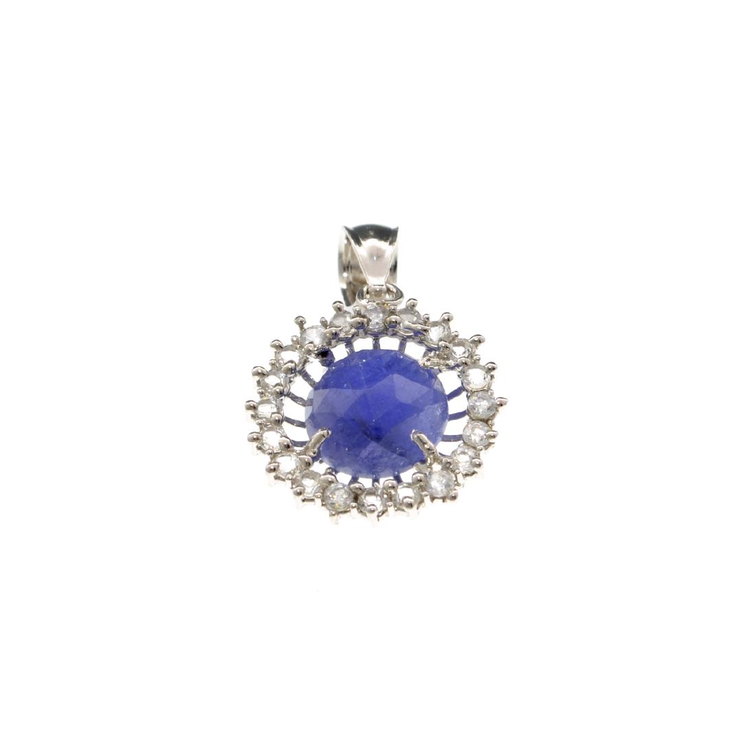 APP: 0.9k Fine Jewelry Designer Sebastian 3.80CT: Gov. File: H-27733 Fine Jewelry Designer Sebastian 3.80CT Cabohon Tanzanite and White Topaz Sterling Silver Pendant Retail Replacement Value: $0.9K Asset Type: Pendant Shipping: $19.95