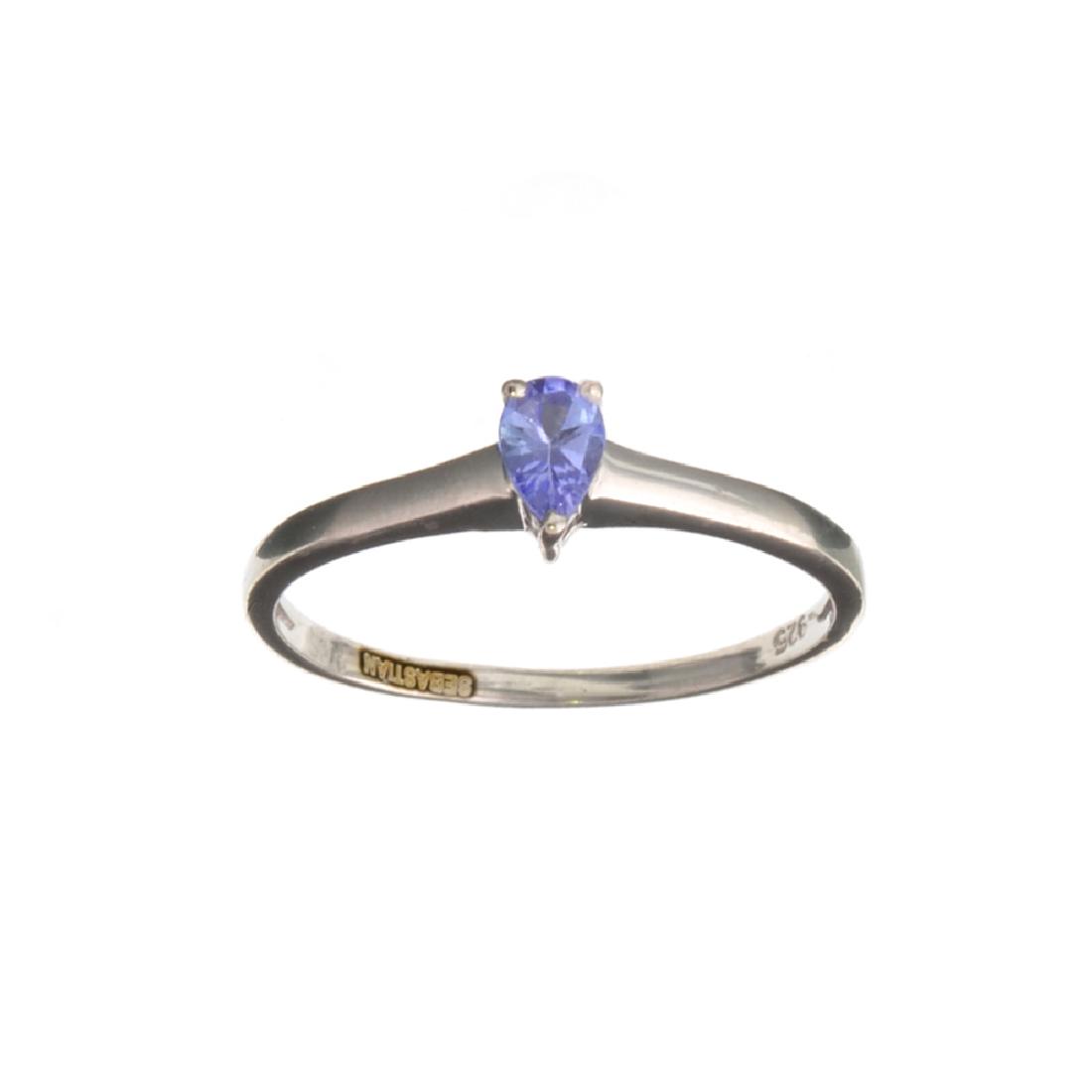 APP: 0.5k Fine Jewelry Designer Sebastian 0.20CT Pear: Gov. File: K-07897 Fine Jewelry Designer Sebastian 0.20CT Pear Cut Tanzanite And Sterling Silver Ring Retail Replacement Value:$0.5KRing Shipping: $19.95