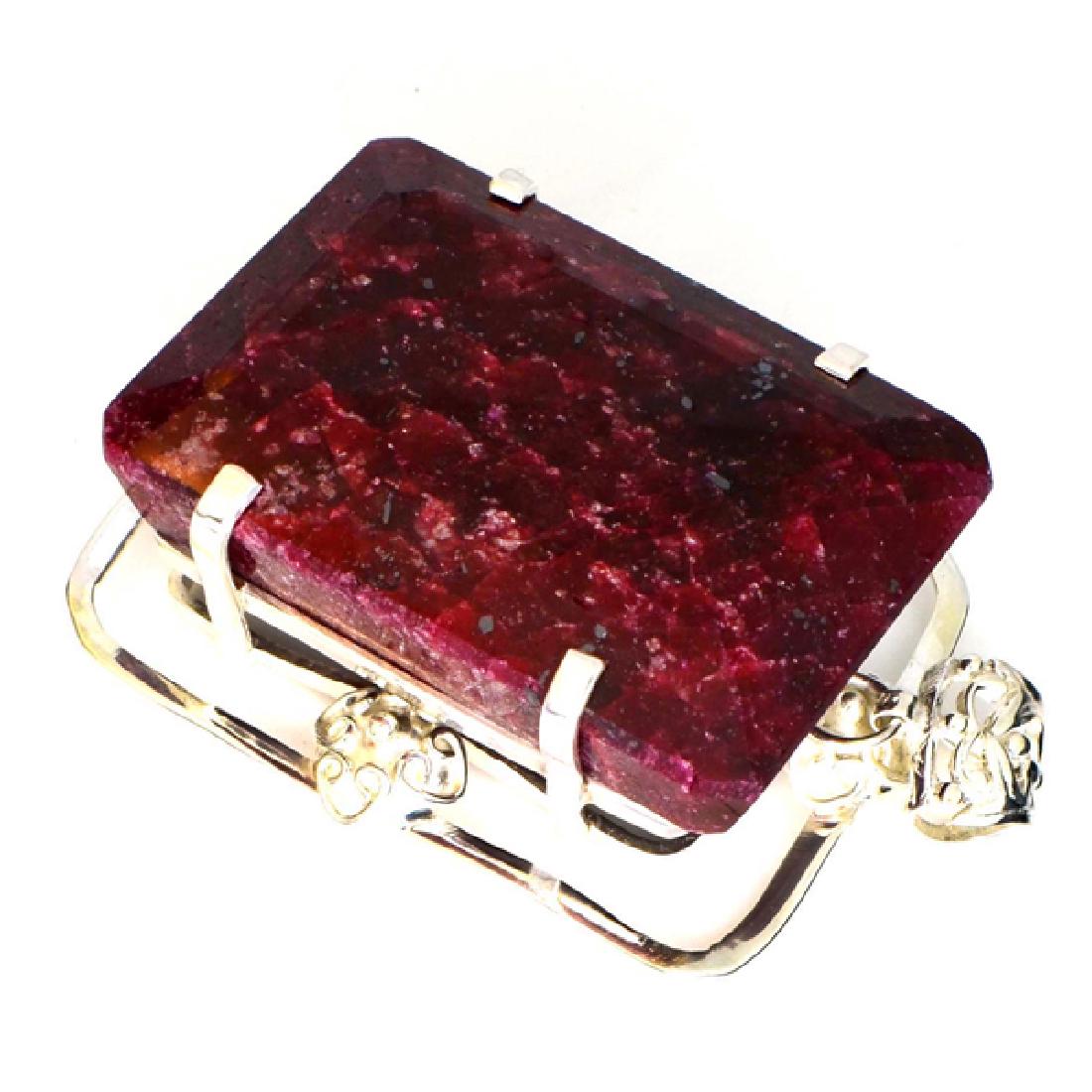 APP: 26.9k Fine Jewelry Designer Sebastian 331.29CT: Gov. File: K-01206 Fine Jewelry Designer Sebastian 331.29CT Emerald Cut Ruby and Sterling Silver Pendant Retail Replacement Value:$26.8KPendant Shipping: $19.95