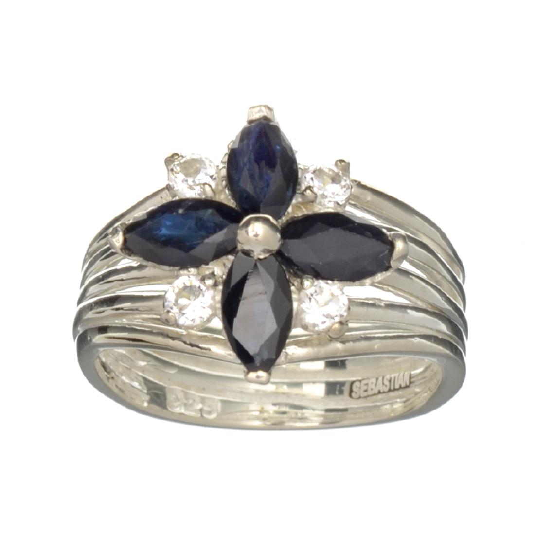 APP: 1k Fine Jewelry Designer Sebastian, 1.88CT: Gov. File: H-32080 Fine Jewelry Designer Sebastian, 1.88CT Sapphire And White Topaz Sterling Silver Ring Retail Replacement Value: $1.0K Asset Type: Ring Shipping: $19.95
