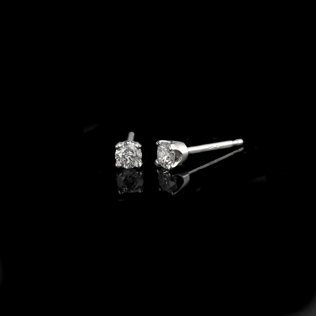 APP: 0.5k *Fine Jewelry 14 kt. White Gold, Custom Made: Gov. File: H-18374 *Fine Jewelry 14 kt. White Gold, Custom Made 0.25CT Round Brilliant Cut Diamond Earrings (VGN A-10) Retail Replacement Value: $0.5K Asset Type: Earrings Shipping: $19.95