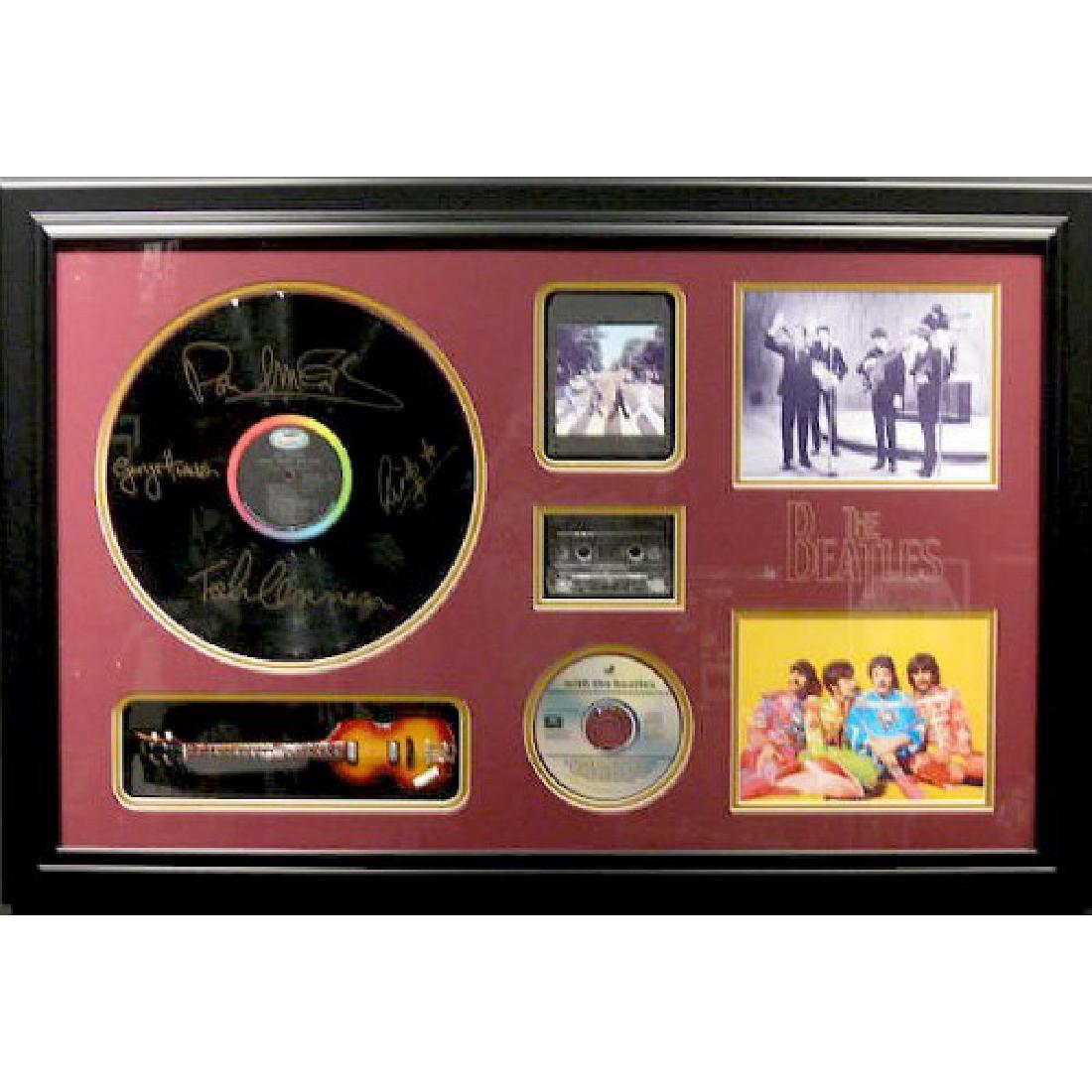 Beatles Mini Guitar Collage - Plate Signatures: Gov. File: M-02303 Beatles Mini Guitar Collage - Plate Signatures Asset Type: MusicShipping: $24.95. Item may be pick up only, or require additional shipping charges due to weight or size.