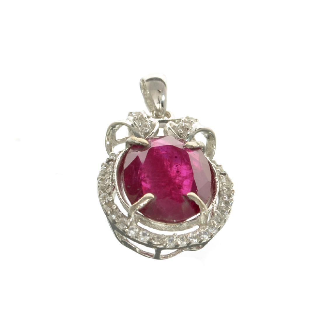 APP: 3.8k Fine Jewelry 10.96CT Ruby And Topaz Platinum: Gov. File: H-00022 Fine Jewelry 10.96CT Ruby And Topaz Platinum Over Sterling Silver Pendant Retail Replacement Value: $3.8K Asset Type: Pendant Shipping: $19.95