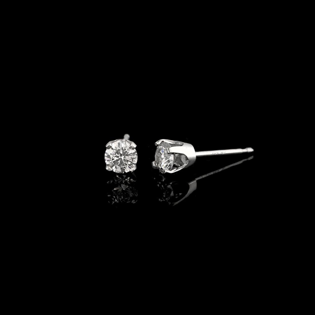 APP: 1.3k *Fine Jewelry 14 kt. White Gold, Custom Made: Gov. File: H-18438 *Fine Jewelry 14 kt. White Gold, Custom Made 0.50CT Round Brilliant Cut Diamond Earrings (VGN A-11) Retail Replacement Value: $1.3K Asset Type: Earrings Shipping: $19.95