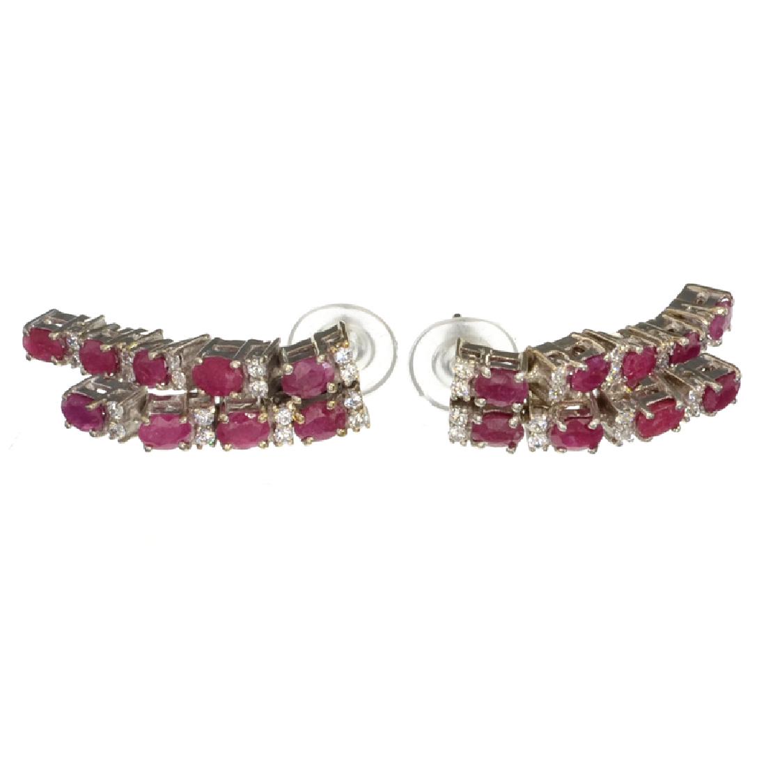APP: 2.3k Fine Jewelry 3.05CT Ruby And Quartz Platinum: Gov. File: H-04648 Fine Jewelry 3.05CT Ruby And Quartz Platinum Over Sterling Silver Earrings Retail Replacement Value: $2.3K Asset Type: Earrings Shipping: $19.95