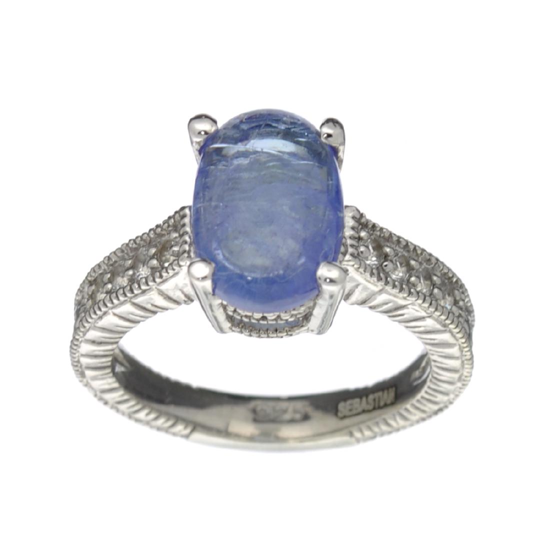 APP: 0.7k Fine Jewelry Designer Sebastian, 3.24CT: Gov. File: H-30712 Fine Jewelry Designer Sebastian, 3.24CT Tanzanite And White Topaz Sterling Silver Ring Retail Replacement Value: $0.7K Asset Type: Ring Shipping: $19.95
