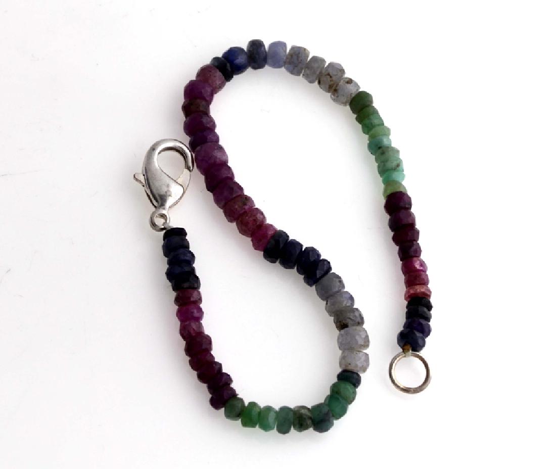 APP: 0.5k Fine Jewelry 33.00CT Round Cut Bead: Gov. File: H-01212 Fine Jewelry 33.00CT Round Cut Bead Ruby/Sapphire/Emerald And Sterling Silver Bracelet Retail Replacement Value: $0.5K Asset Type: Bracelet Shipping: $19.95