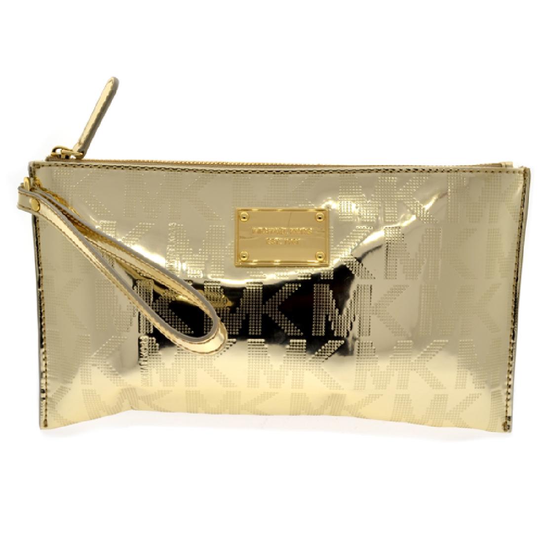 ^Brand New Michael Kors Jet Set Mirror Metallic Large: Gov. File: T-10547 ^Brand New Michael Kors Jet Set Mirror Metallic Large Pale Gold NS Zip Clutch Asset Type: Clutch Shipping: $29.95