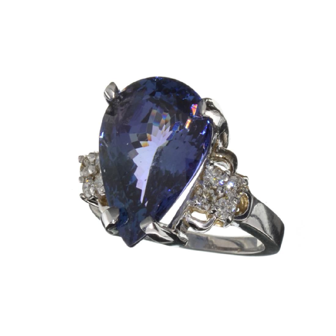 APP: 35.8k 14 kt. White Gold, 13.96CT Pear Cut: Gov. File: 95329 14 kt. White Gold, 13.96CT Pear Cut Tanzanite And 0.34CT Diamond Ring Retail Replacement Value: $35.8K Asset Type: Ring Shipping: $19.95