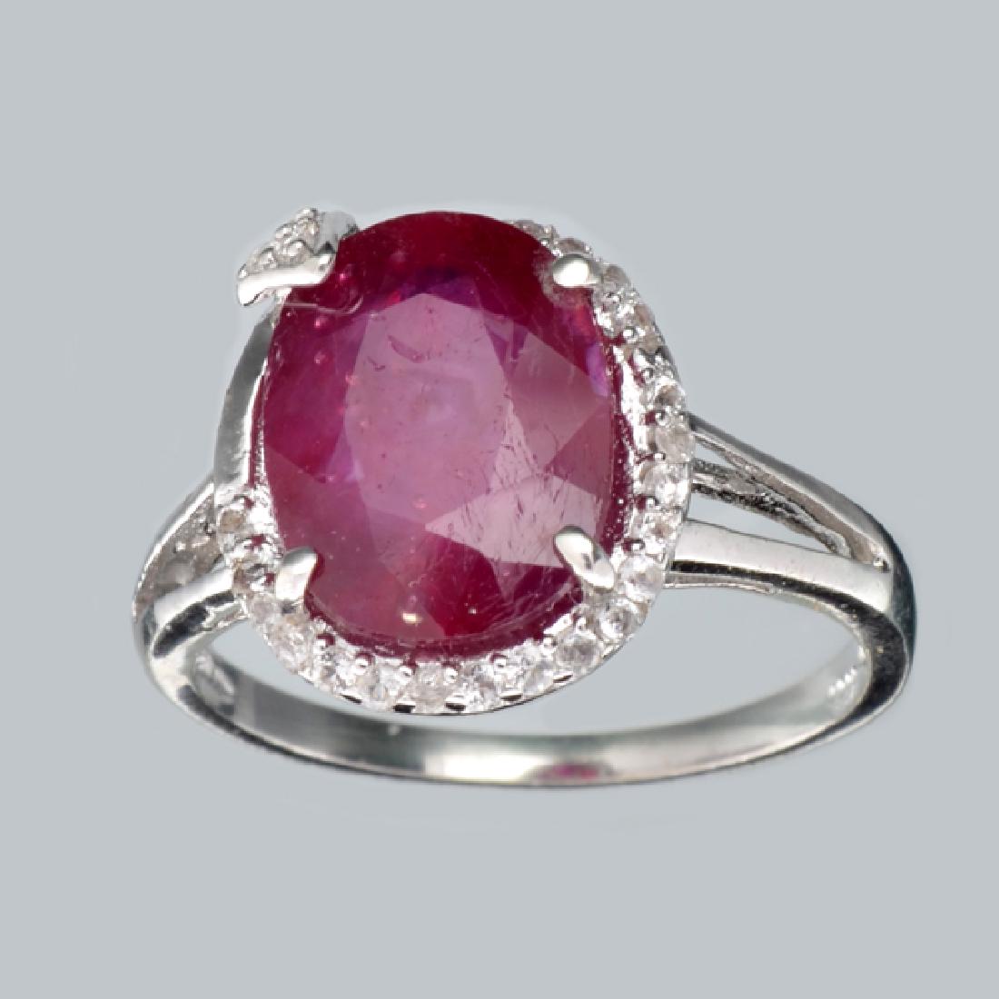 APP: 2.2k 4.19CT Ruby And Colorless Topaz Platinum Over: Gov. File: 92222 4.19CT Ruby And Colorless Topaz Platinum Over Sterling Silver Ring Retail Replacement Value: $2.2K Asset Type: Ring Shipping: $19.95