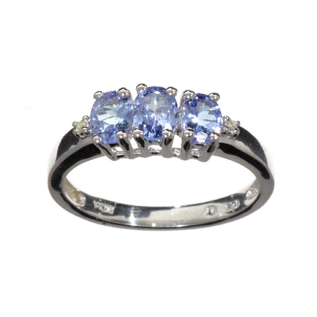 APP: 1k Fine Jewelry 0.99CT Tanzanite And Diamond: Gov. File: H-13892 Fine Jewelry 0.99CT Tanzanite And Diamond Platinum Over Sterling Silver Ring Retail Replacement Value: $1.0K Asset Type: Ring Shipping: $19.95