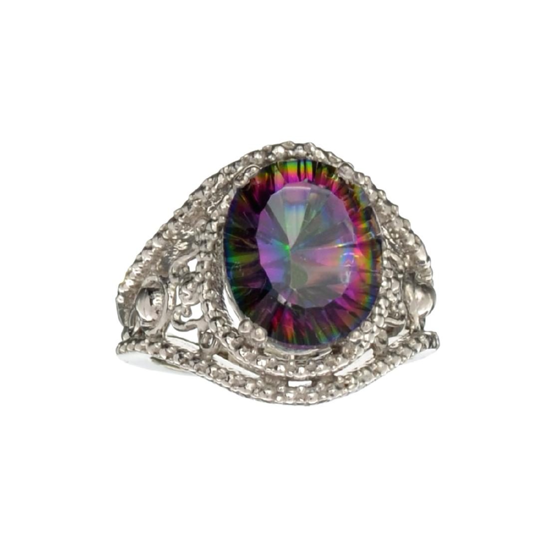 APP: 0.4k Fine Jewelry 3.10CT Oval Cut Multicolor: Gov. File: H-22652 Fine Jewelry 3.10CT Oval Cut Multicolor Mystic Quartz And Sterling Silver Ring Retail Replacement Value: $0.4K Asset Type: Ring Shipping: $19.95