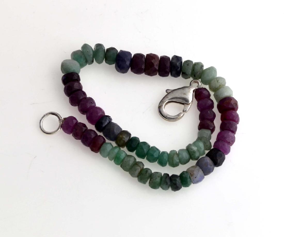 APP: 0.5k Fine Jewelry 33.00CT Round Cut Bead: Gov. File: H-01219 Fine Jewelry 33.00CT Round Cut Bead Ruby/Sapphire/Emerald And Sterling Silver Bracelet Retail Replacement Value: $0.5K Asset Type: Bracelet Shipping: $19.95