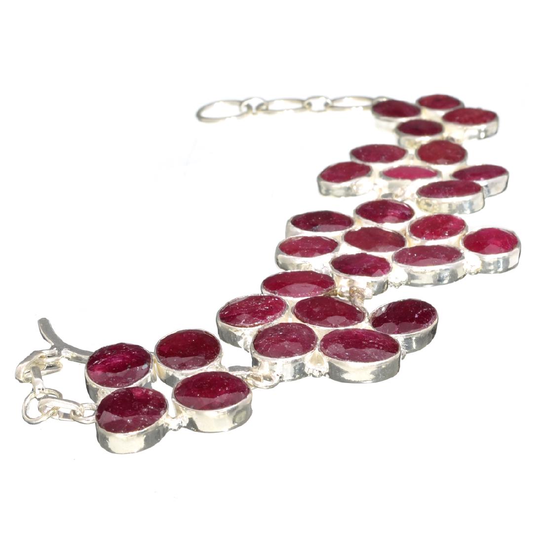 APP: 11k 95.87CT Oval Cut Ruby and Sterling Silver: Gov. File: 57965 95.87CT Oval Cut Ruby and Sterling Silver Bracelet Retail Replacement Value: $11.0K Asset Type: Bracelet Shipping: $19.95
