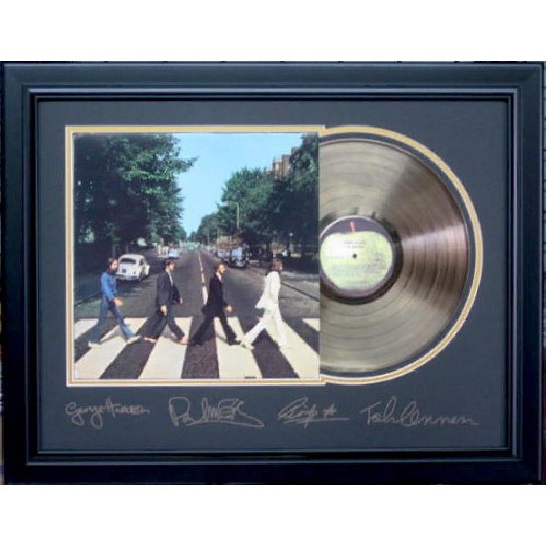 Beatles Engraved Abbey Road Gold Record: Gov. File: M-10558 Beatles Engraved Abbey Road Gold Record Asset Type: MusicShipping: $24.95. Item may be pick up only, or require additional shipping charges due to weight or size.
