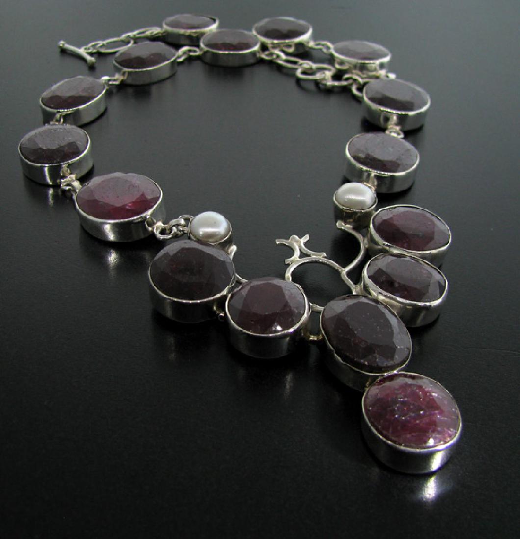 APP: 93k 287.33CT Ruby and Sterling Silver Necklace: Gov. File: 33445 287.33CT Ruby and Sterling Silver Necklace Retail Replacement Value: $93.0K Asset Type: Necklace Shipping: $19.95