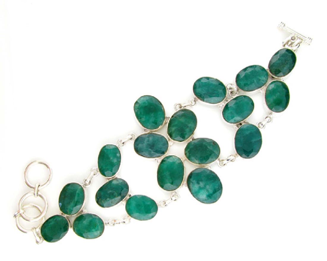 APP: 8.8k 105.95CT Oval Cut Green Beryl and Sterling: Gov. File: 65518 105.95CT Oval Cut Green Beryl and Sterling Silver Bracelet Retail Replacement Value: $8.8K Asset Type: Bracelet Shipping: $19.95