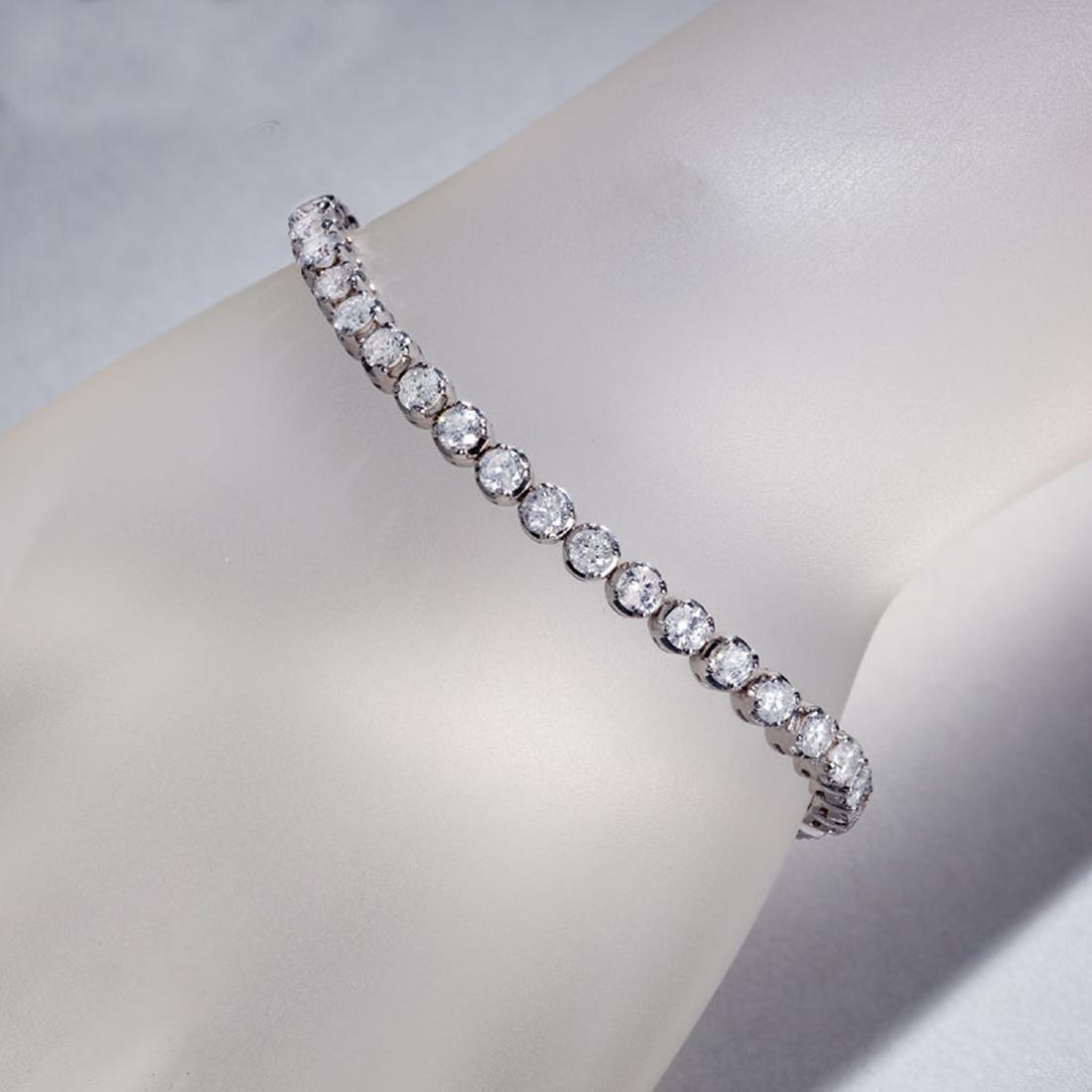 APP: 16.5k *Fine Jewelry 14KT White Gold, 7.00CT Round: Gov. File: H-46704 *Fine Jewelry 14KT White Gold, 7.00CT Round Brilliant Cut Diamond Bracelet (VGN A-43) (Vault V) Retail Replacement Value: $16.5K Asset Type: Bracelet Shipping: $19.95