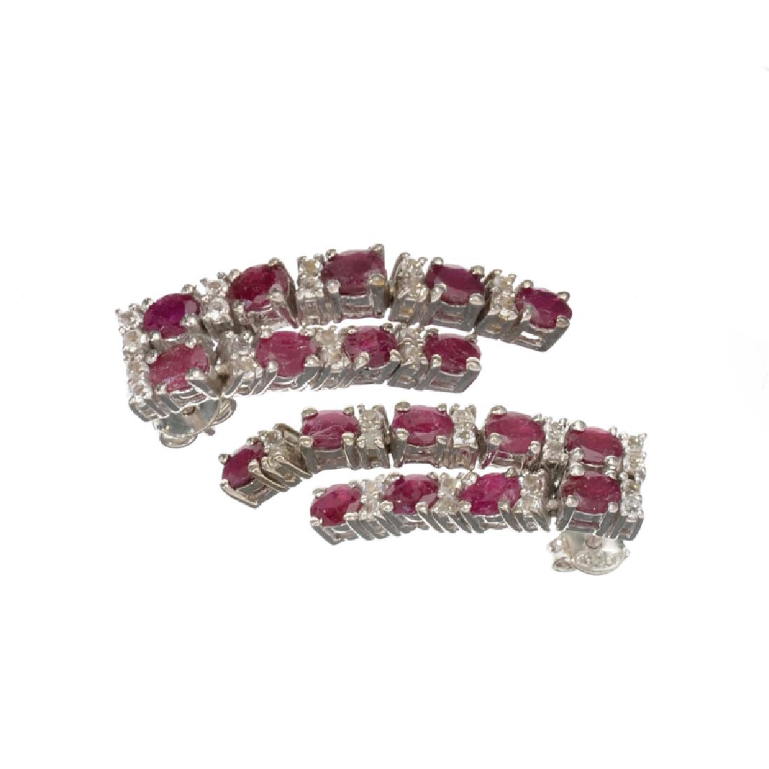 Fine Jewelry 3.08CT Oval Cut Ruby And Colorless Topaz: Gov. File: H-09780 Fine Jewelry 3.08CT Oval Cut Ruby And Colorless Topaz Platinum Over Sterling Silver Earrings Retail Replacement Value: $2.3K Asset Type: Earrings Shipping: $19.95