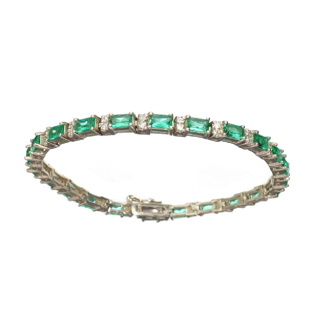 APP: 0.8k Fine Jewelry 6.65CT Green Crystal And: Gov. File: H-16243 Fine Jewelry 6.65CT Green Crystal And Platinum Over Sterling Silver Bracelet Retail Replacement Value: $0.8K Asset Type: Bracelet Shipping: $19.95