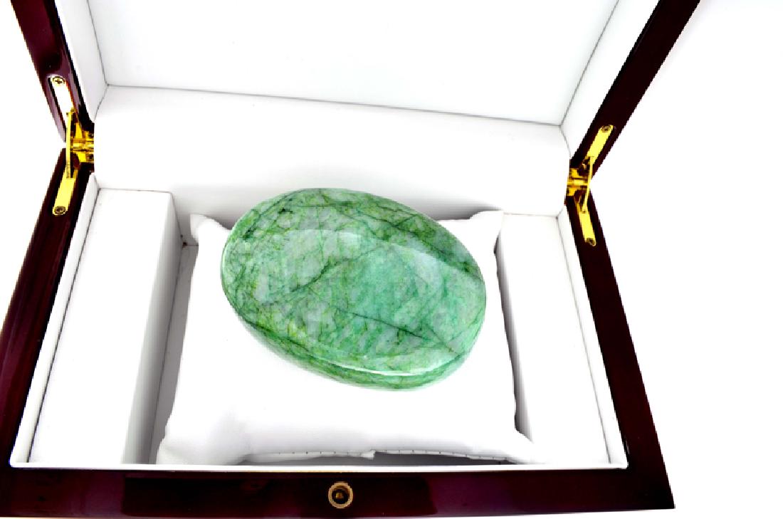 APP: 6.4k 1,286.50CT Oval Cut Cabochon Green Beryl: Gov. File: H-01566 1,286.50CT Oval Cut Cabochon Green Beryl Emerald Gemstone Retail Replacement Value: $6.4K Asset Type: Gemstone Shipping: $19.95