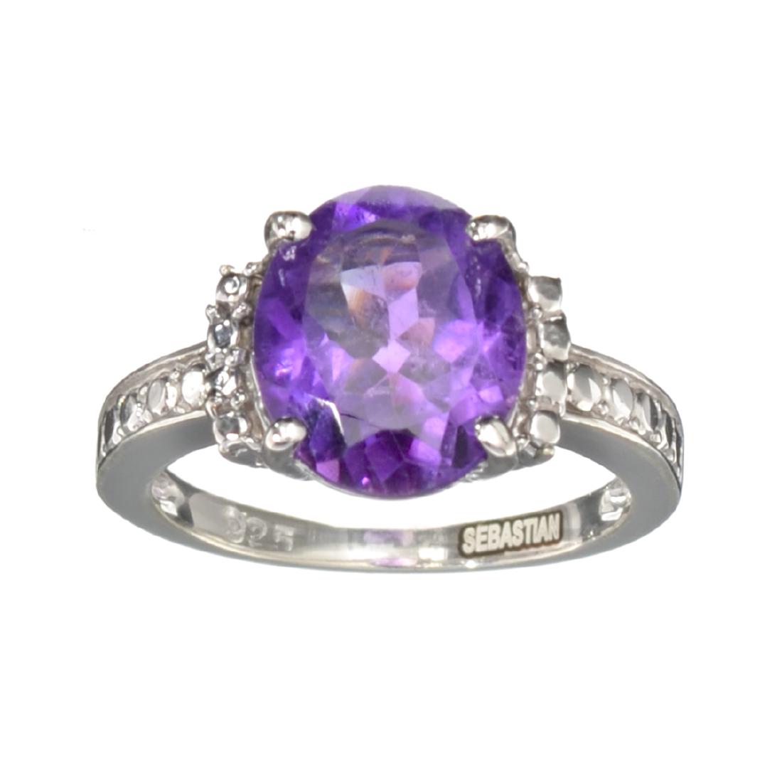 APP: 0.5k Fine Jewelry Designer Sebastian, 3.32CT Oval: Gov. File: H-32004 Fine Jewelry Designer Sebastian, 3.32CT Oval Cut Amethyst And Sterling Silver Ring Retail Replacement Value: $0.5K Asset Type: Ring Shipping: $19.95