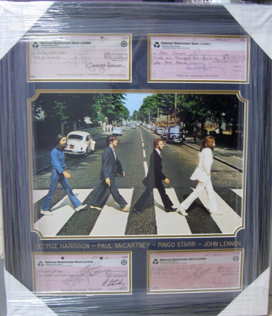 *Beatles Signed Copied Bank Checks Collage: Gov. File: M-14143 *Beatles Signed Copied Bank Checks Collage Asset Type: CollectableShipping: $24.95. Item may be pick up only, or require additional shipping charges due to weight or size.
