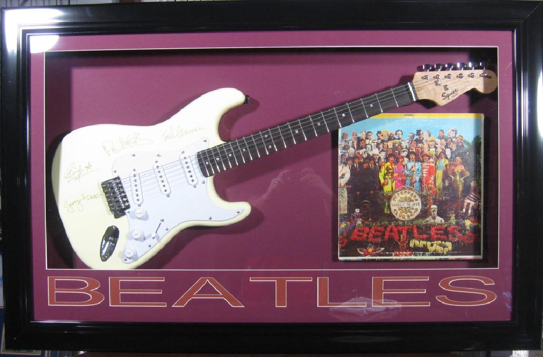 Beatles Laser Engraved Guitar - Plate Signatures: Gov. File: M-09911 Beatles Laser Engraved Guitar - Plate Signatures Asset Type: Music Shipping: $24.95. Item may be pick up only, or require additional shipping charges due to weight or size.