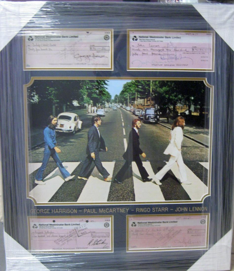 *Beatles Signed Copied Bank Checks Collage: Gov. File: M-14148 *Beatles Signed Copied Bank Checks Collage Asset Type: CollectableShipping: $24.95. Item may be pick up only, or require additional shipping charges due to weight or size.