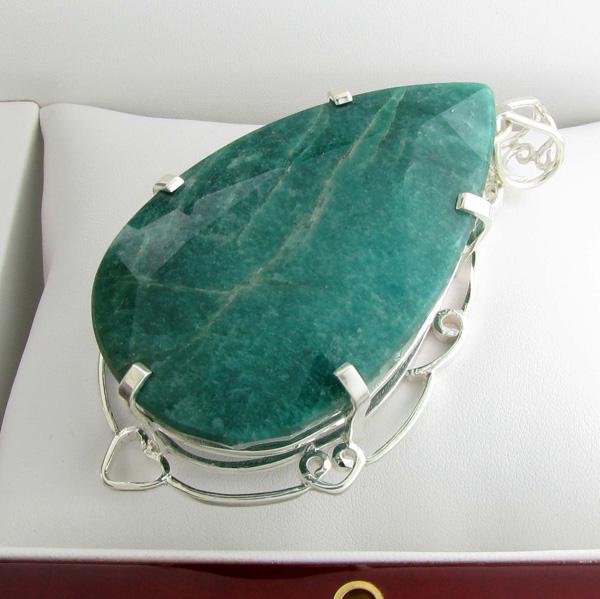 APP: 16.5k Fine Jewelry Designer Sebastian 407.66CT: Gov. File: K-01166 Fine Jewelry Designer Sebastian 407.66CT Pear Cut Emerald and Sterling Silver Pendant Retail Replacement Value:$16.5KAsset Type: Pendant Shipping: $19.95
