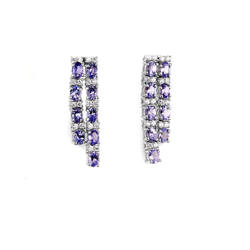 APP: 3.2k Fine Jewelry 3.73CT Tanzanite And Topaz: Gov. File: H-02534 Fine Jewelry 3.73CT Tanzanite And Topaz Platinum Over Sterling Silver Earrings Retail Replacement Value: $3.2K Asset Type: Earrings Shipping: $19.95