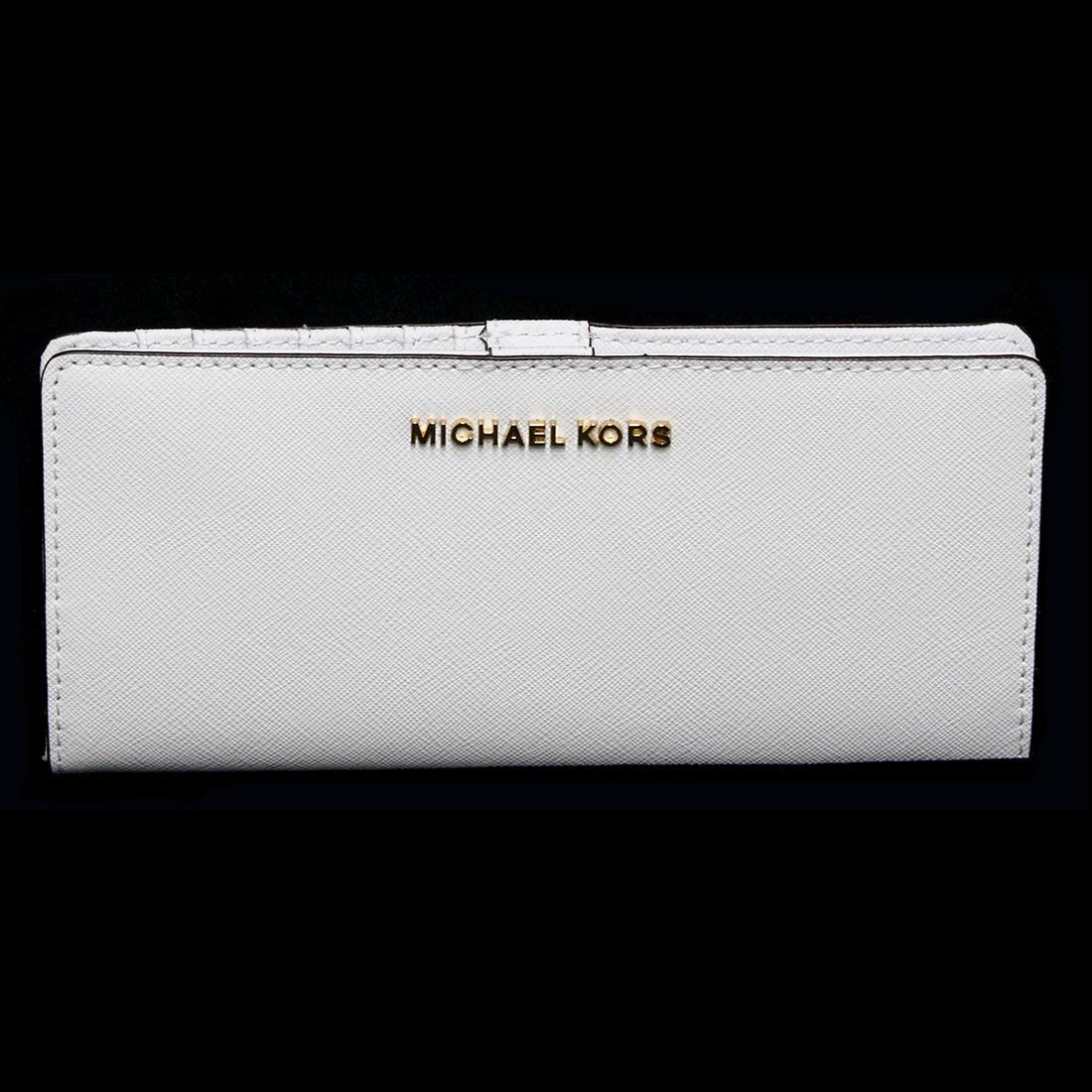 Gorgeous Brand New Never Used Optic White Michael Kors: Gov. File: T-17794 Gorgeous Brand New Never Used Optic White Michael Kors Flat Slim Bi-fold Wallet Bag Tag Price $128 Asset Type: Michael Kors PursesShipping: $29.95