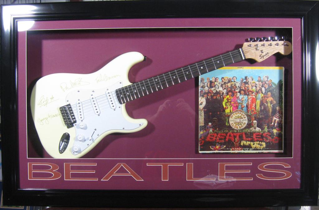 Beatles Laser Engraved Guitar - Plate Signatures: Gov. File: M-09902 Beatles Laser Engraved Guitar - Plate Signatures Asset Type: Music Shipping: $24.95. Item may be pick up only, or require additional shipping charges due to weight or size.