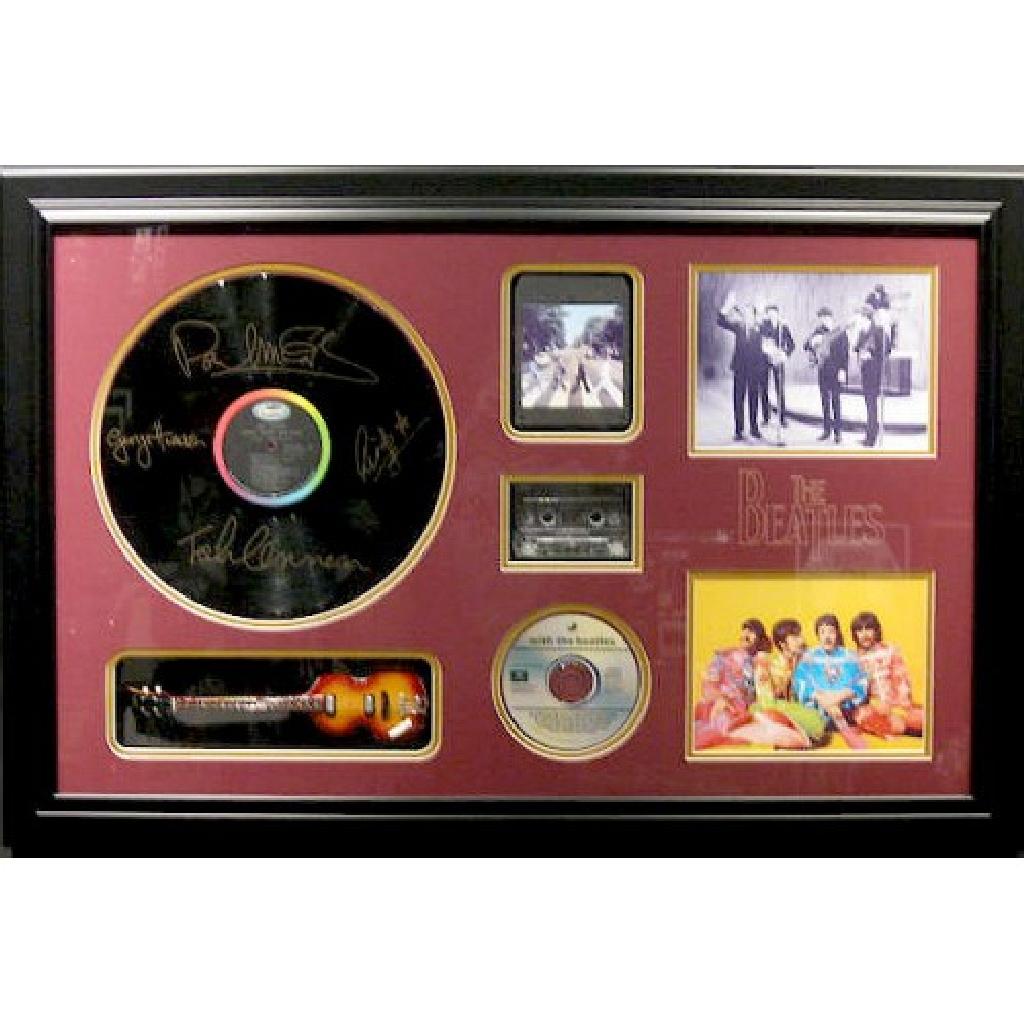 Beatles Mini Guitar Collage - Plate Signatures: Gov. File: M-09967 Beatles Mini Guitar Collage - Plate Signatures Asset Type: MusicShipping: $24.95. Item may be pick up only, or require additional shipping charges due to weight or size.